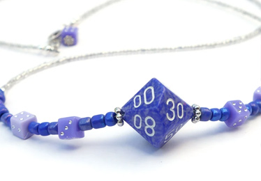 Closeup of purple beaded dice necklace